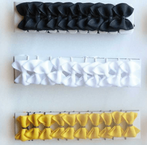 GOMAS PARA CRINES CON FORMA DE LAZO